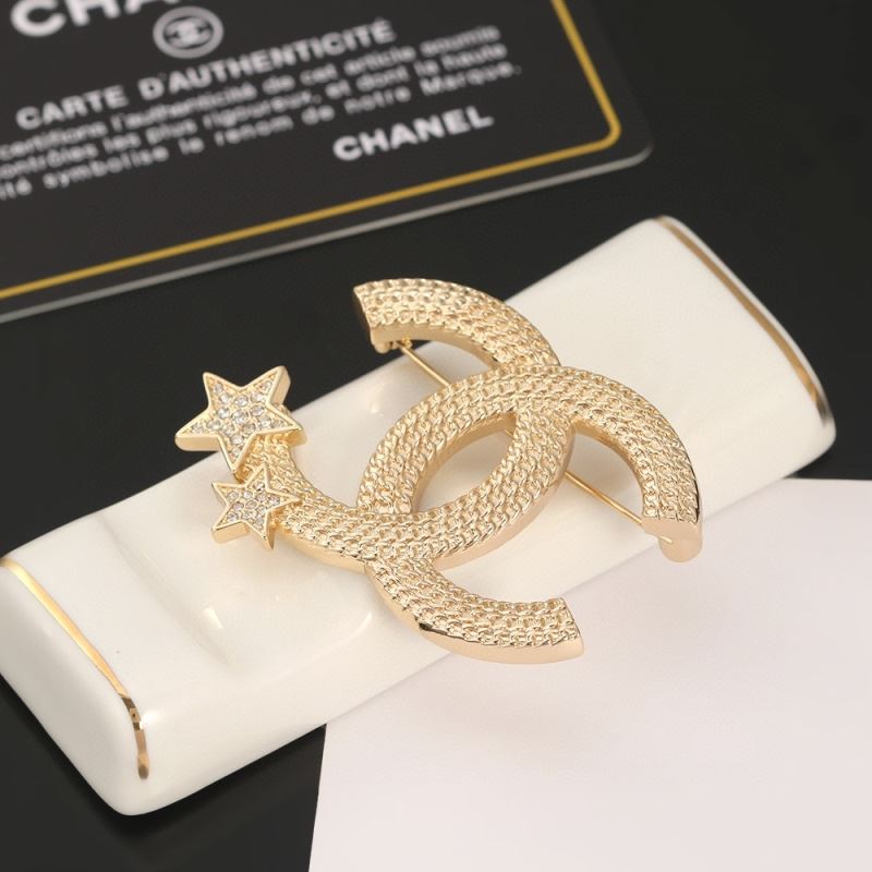 Ch**el brooches